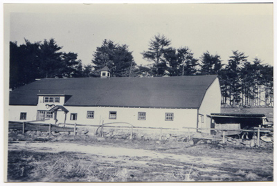1937 – The summer that this picture was taken was a grueling one. A retaining wall had to be built to facilitate an expected silo, against the steep hill to the back of the barn. The wall is still there today. A storage shed would also be installed, which stood until the constrcution of the new barn in 2002.