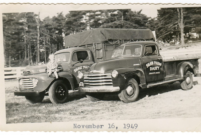 November 10, 1949 – After Winthrop moved to California to deal with emphezema, this image was taken showing a new Chevrolet pickup, and a Ford farm truck. Leah Huse is shown sitting on the cab of the Ford, at age 4.