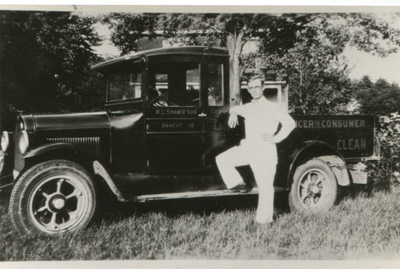 1927 – Albert Shaw 20 years old, in front of our 1927 Dodge Brothers truck. It was a one ton, with body by Graham. They called it a Graham Dodge.